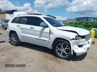 2019 Jeep Grand Cherokee Overland z VIN 1C4RJECG7KC556124, wystawiony jako IAAI lot #42639595 z przebiegiem 38 962 mil mil oraz . Historia ofert i sprzedaży dostępna na DreamBid. Obrazek 1.