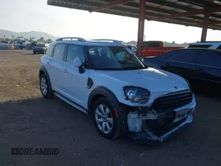 2019 MINI Countryman Cooper with VIN WMZYS7C51K3F46419, listed as a IAAI auction lot 41228467 with 59,154 mi miles. Bid and sale history available at carsss.com. Image 1.