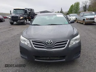 2011 Toyota Camry LE with VIN 4T1BF3EKXBU719590, listed as a IAAI auction lot 42007659 with 232,349 mi miles and . Bid and sale history available at DreamBid. Image 12.