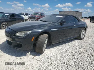 2014 BMW 6 Series 650i with VIN WBAYP9C54ED169493, listed as a Copart auction lot 72182474 with Not Provided miles and Salvage Title. Bid and sale history available at carsss.com. Image 1.