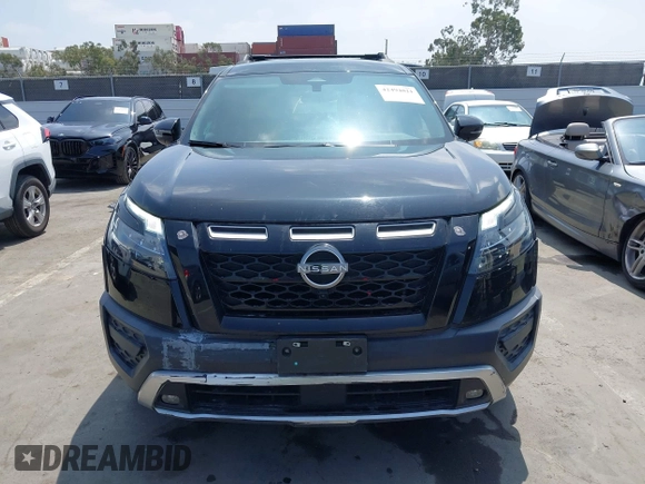 2023 Nissan Pathfinder Rock Creek with VIN 5N1DR3BD6PC258228, listed as a IAAI auction lot 42494821 with 33,928 mi miles and . Bid and sale history available at DreamBid. Image 12.