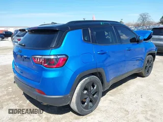 2021 Jeep Compass Altitude with VIN 3C4NJCBB0MT523322, listed as a IAAI auction lot 41989408 with 64,880 mi miles. Bid and sale history available at carsss.com. Image 4.