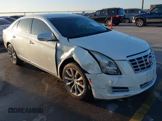 2015 Cadillac XTS Luxury z VIN 2G61M5S35F9275250, wystawiony jako IAAI lot #41247067 z przebiegiem 114 023 mil mil oraz . Historia ofert i sprzedaży dostępna na DreamBid. Obrazek 1.