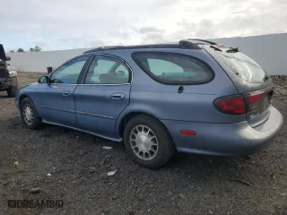 1999 Ford Taurus SE with VIN 1FAFP58S2XA261374, listed as a Copart auction lot 74180494 with 193,416 mi miles and Salvage Title. Bid and sale history available at carsss.com. Image 2.