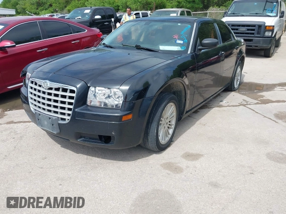 2009 Chrysler 300 LX with VIN 2C3KA43D19H536142, listed as a IAAI auction lot 42025538 with 1 mi miles. Bid and sale history available at carsss.com. Image 2.