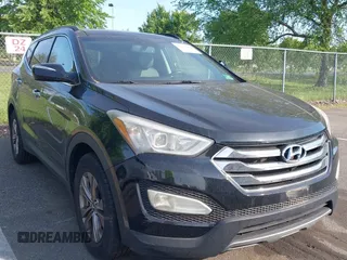 2014 Hyundai Santa Fe z VIN 5XYZUDLB8EG231293, wystawiony jako IAAI lot #42137439 z przebiegiem 77 799 mil mil oraz . Historia ofert i sprzedaży dostępna na DreamBid. Obrazek 1.