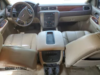 2009 GMC Yukon SLT w/4SA with VIN 1GKEC33309R214195, listed as a Copart auction lot 61430404 with 174,776 mi miles and Salvage Title. Bid and sale history available at carsss.com. Image 8.