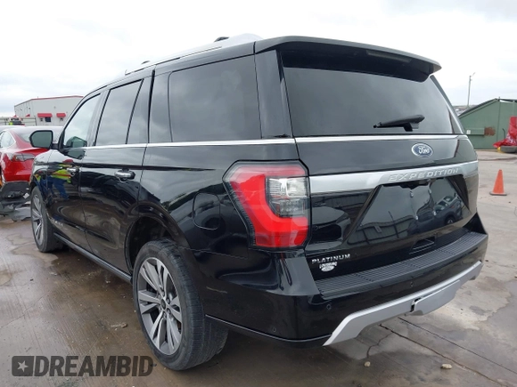 2019 Ford Expedition Platinum with VIN 1FMJU1MT8KEA02325, listed as a IAAI auction lot 41861772 with 77,124 mi miles. Bid and sale history available at carsss.com. Image 3.