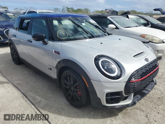 2023 MINI Clubman John Cooper Works with VIN WMWJZ9C06P2S78410, listed as a Copart auction lot 75642174 with 0 mi miles and Non Repairable. Bid and sale history available at carsss.com. Image 4.