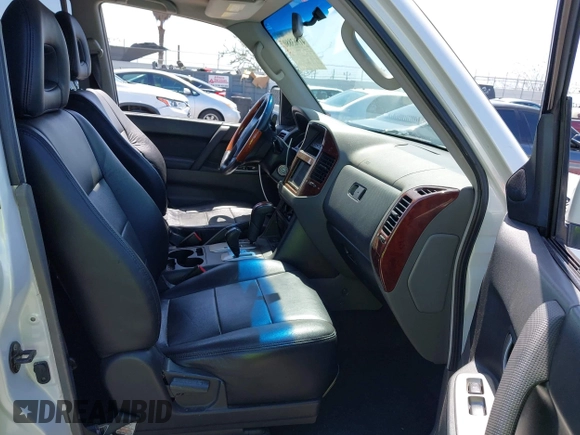 2003 Mitsubishi Montero Limited z VIN JA4NW51S43J017989, wystawiony jako IAAI lot #41963880 z przebiegiem 161 443 mil mil oraz . Historia ofert i sprzedaży dostępna na DreamBid. Obrazek 5.