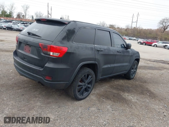 2013 Jeep Grand Cherokee Laredo with VIN 1C4RJEAG2DC573970, listed as a IAAI auction lot 41892914 with 185,050 mi miles. Bid and sale history available at carsss.com. Image 4.