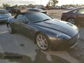2008 Aston Martin Vantage z VIN SCFBB04B88GD08555, wystawiony jako Copart lot #73878724 z przebiegiem Nie podano mil oraz Szkoda całkowita • Salvage title. Historia ofert i sprzedaży dostępna na DreamBid. Obrazek 4.