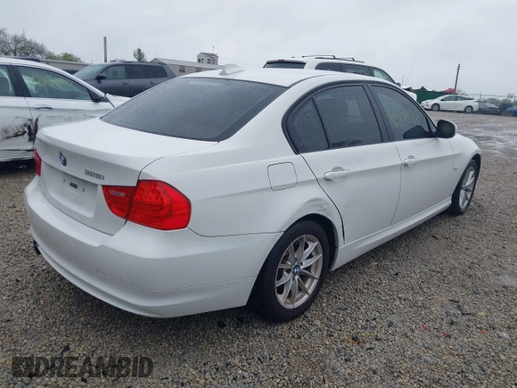 2010 BMW 3 Series 328i with VIN WBAPH7G59ANM52662, listed as a IAAI auction lot 42170338 with 163,648 mi miles and . Bid and sale history available at carsss.com. Image 4.