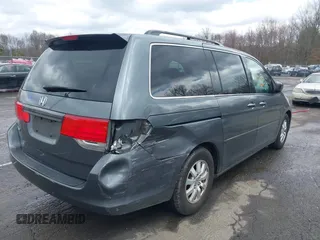 2010 Honda Odyssey EX-L with VIN 5FNRL3H75AB050705, listed as a IAAI auction lot 41953803 with 196,827 mi miles. Bid and sale history available at carsss.com. Image 4.