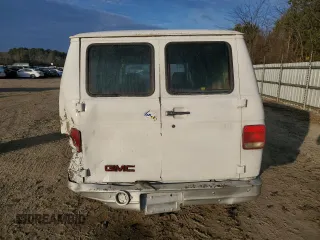 1992 GMC Vandura z VIN 2GTGG39KXN4515226, wystawiony jako Copart lot #85211254 z przebiegiem 594 809 mil mil oraz Szkody całkowita. Historia ofert i sprzedaży dostępna na DreamBid. Obrazek 6.