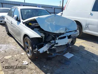 2013 BMW 3 Series 320i with VIN WBA3B1C56DF462549, listed as a IAAI auction lot 41411287 with 119,146 mi miles. Bid and sale history available at carsss.com. Image 1.