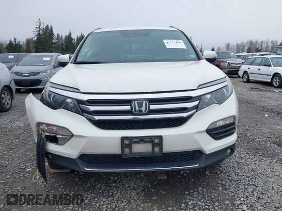 2017 Honda Pilot Elite with VIN 5FNYF6H06HB096156, listed as a IAAI auction lot 41771161 with 73,889 mi miles and . Bid and sale history available at DreamBid. Image 12.