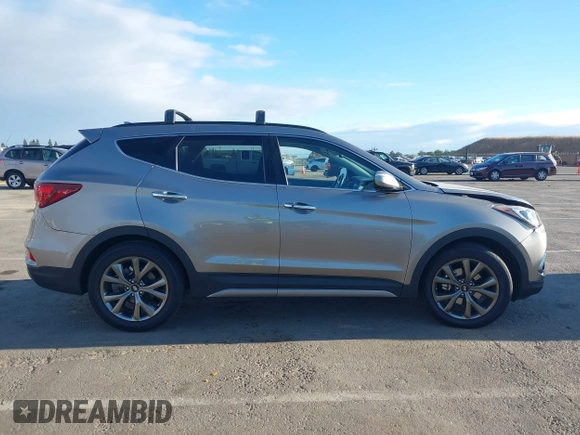 2018 Hyundai Santa Fe Ultimate z VIN 5XYZW4LA1JG515019, wystawiony jako IAAI lot #42248389 z przebiegiem 60 222 mil mil oraz . Historia ofert i sprzedaży dostępna na DreamBid. Obrazek 13.