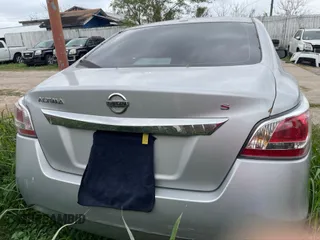 2015 Nissan Altima S with VIN 1N4AL3AP7FN348629, listed as a IAAI auction lot 41723798 with 283,642 mi miles and . Bid and sale history available at DreamBid. Image 14.