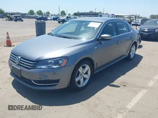 2014 Volkswagen Passat S with VIN 1VWAT7A30EC025433, listed as a IAAI auction lot 42197150 with 141,276 mi miles and . Bid and sale history available at DreamBid. Image 2.