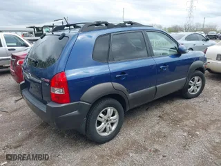 2006 Hyundai Tucson GLS with VIN KM8JN72D36U409525, listed as a IAAI auction lot 42082119 with 142,163 mi miles. Bid and sale history available at carsss.com. Image 4.