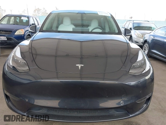 2024 Tesla Model Y Long Range z VIN 7SAYGDEE2RF069588, wystawiony jako IAAI lot #42024180 z przebiegiem 13 230 mil mil oraz . Historia ofert i sprzedaży dostępna na DreamBid. Obrazek 12.
