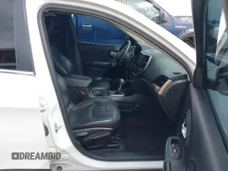 2016 Jeep Cherokee Limited with VIN 1C4PJLDB4GW233315, listed as a IAAI auction lot 41788329 with 116,174 mi miles. Bid and sale history available at carsss.com. Image 5.