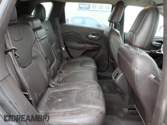 2015 Jeep Cherokee Trailhawk with VIN 1C4PJMBB6FW574108, listed as a Copart auction lot 57798475 with 105,022 mi miles and Salvage title. Bid and sale history available at DreamBid. Image 11.