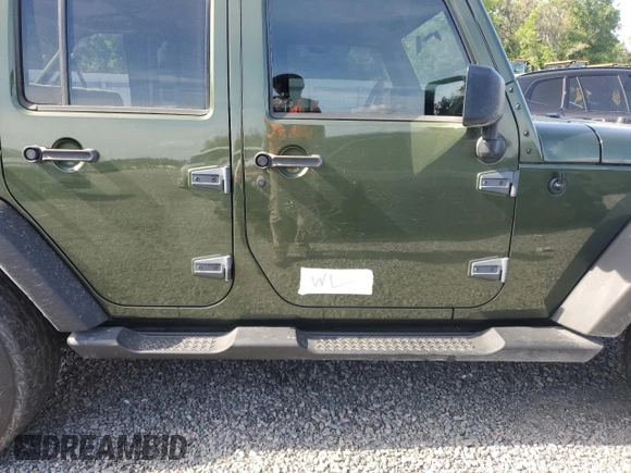 2008 Jeep Wrangler Unlimited X with VIN 1J4GB39108L608465, listed as a Copart auction lot 50949015 with 103,205 mi miles and Salvage Title. Bid and sale history available at DreamBid. Image 12.