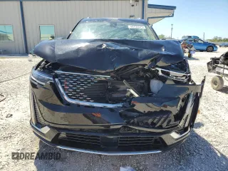 2024 Cadillac XT6 Premium Luxury z VIN 1GYKPERS1RZ755490, wystawiony jako Copart lot #49706575 z przebiegiem 4 239 mil mil oraz Szkoda całkowita • Salvage title. Historia ofert i sprzedaży dostępna na DreamBid. Obrazek 5.