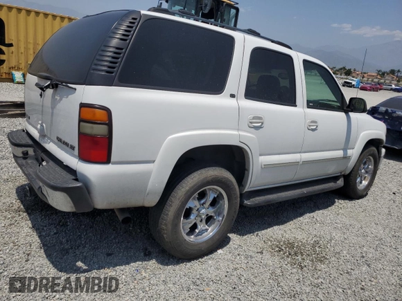 2004 Chevrolet Tahoe LS z VIN 1GNEC13T94R165160, wystawiony jako Copart lot #59994985 z przebiegiem 303 473 mil mil oraz Szkoda całkowita • Salvage title. Historia ofert i sprzedaży dostępna na DreamBid. Obrazek 3.