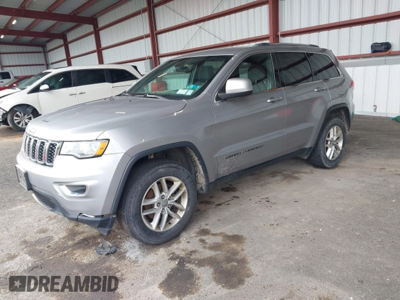 2018 Jeep Grand Cherokee Laredo E with VIN 1C4RJFAG7JC130313, listed as a IAAI auction lot 41969759 with 177,017 mi miles and . Bid and sale history available at DreamBid. Image 2.