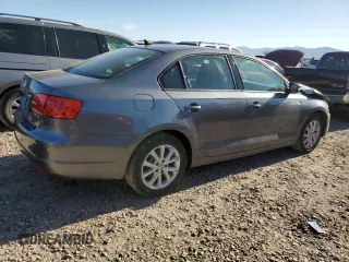 2011 Volkswagen Jetta SE z VIN 3VWDZ7AJ0BM395785, wystawiony jako Copart lot #55982785 z przebiegiem 116 183 mil mil oraz Szkoda całkowita • Salvage title. Historia ofert i sprzedaży dostępna na DreamBid. Obrazek 3.