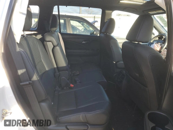 2019 Honda Passport EX-L z VIN 5FNYF8H57KB029404, wystawiony jako Copart lot #86810504 z przebiegiem Nie podano mil oraz Szkoda całkowita • Salvage title. Historia ofert i sprzedaży dostępna na DreamBid. Obrazek 11.