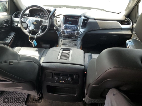 2015 Chevrolet Tahoe LTZ with VIN 1GNSKCKC9FR698924, listed as a Copart auction lot 56196895 with 184,740 mi miles and Salvage title. Bid and sale history available at DreamBid. Image 8.