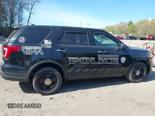 2018 Ford Police Interceptor Utility z VIN 1FM5K8AR9JGC17739, wystawiony jako IAAI lot #42134465 z przebiegiem 134 939 mil mil oraz . Historia ofert i sprzedaży dostępna na DreamBid. Obrazek 13.