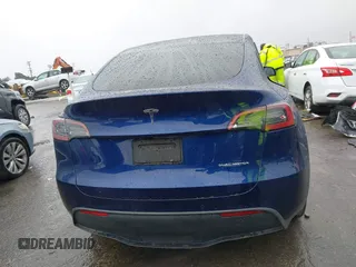 2022 Tesla Model Y Long Range with VIN 7SAYGDEE8NF511395, listed as a IAAI auction lot 41595310 with 65,156 mi miles and . Bid and sale history available at carsss.com. Image 16.