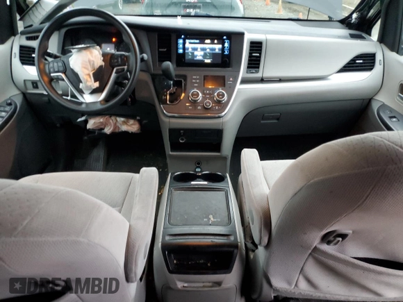 2015 Toyota Sienna LE AAS with VIN 5TDKK3DC4FS676241, listed as a Copart auction lot 83759014 with 133,659 mi miles and Salvage Title. Bid and sale history available at DreamBid. Image 8.
