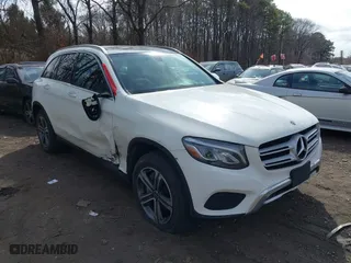 2019 Mercedes-Benz GLC with VIN WDC0G4KB3K1005332, listed as a IAAI auction lot 41774506 with 73,934 mi miles. Bid and sale history available at carsss.com. Image 1.