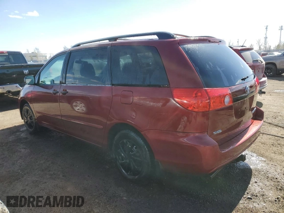 2010 Toyota Sienna with VIN 5TDZK4CC2AS303424, listed as a Copart auction lot 52880635 with 247,596 mi miles and Salvage Title. Bid and sale history available at DreamBid. Image 2.