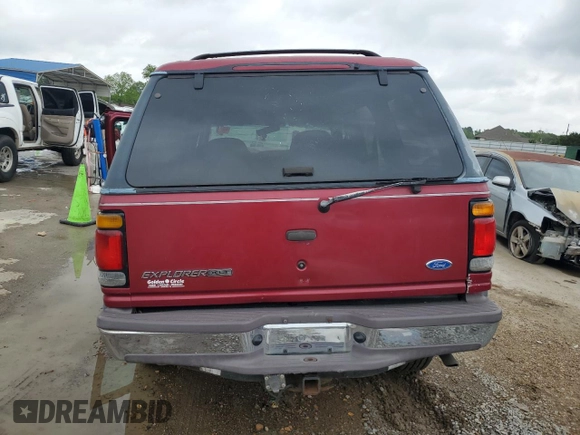 1996 Ford Explorer XL z VIN 1FMDU32X5TUD14799, wystawiony jako Copart lot #54529405 z przebiegiem 195 730 mil mil oraz Szkoda całkowita • Salvage title. Historia ofert i sprzedaży dostępna na DreamBid. Obrazek 6.