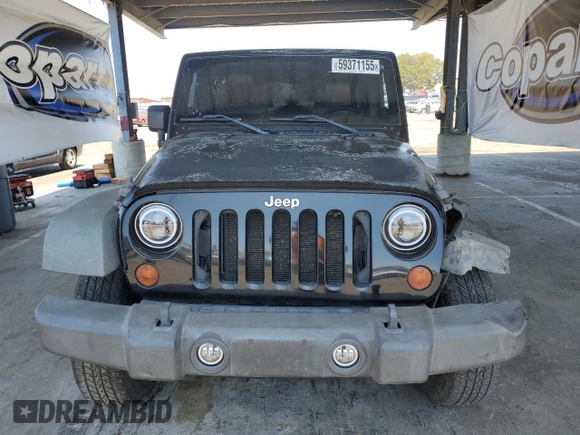 2011 Jeep Wrangler Unlimited Rubicon with VIN 1J4HA6H1XBL589103, listed as a Copart auction lot 59371155 with 156,320 mi miles and Salvage title. Bid and sale history available at DreamBid. Image 5.