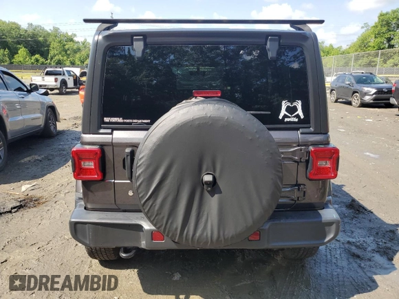 2018 Jeep Wrangler Unlimited Sahara with VIN 1C4HJXEGXJW229881, listed as a Copart auction lot 58762775 with 82,470 mi miles and Salvage title. Bid and sale history available at DreamBid. Image 6.