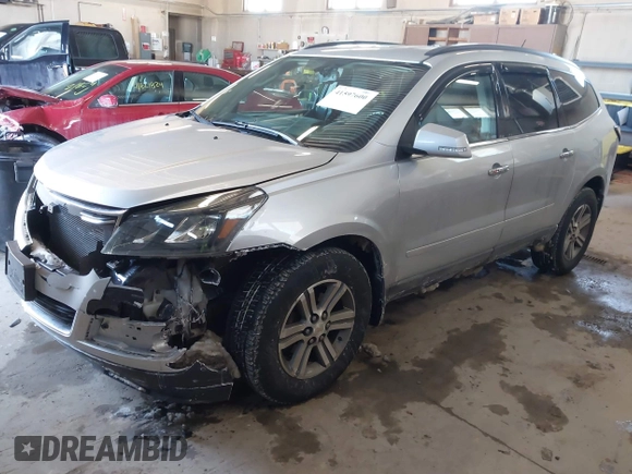 2015 Chevrolet Traverse LT with VIN 1GNKVHKD3FJ126405, listed as a IAAI auction lot 41597600 with 188,558 mi miles and . Bid and sale history available at DreamBid. Image 2.