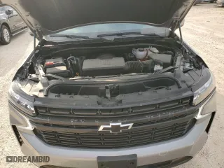 2023 Chevrolet Suburban RST with VIN 1GNSCEKD9PR556589, listed as a Copart auction lot 76045104 with 7,411 mi miles and Salvage Title. Bid and sale history available at carsss.com. Image 12.