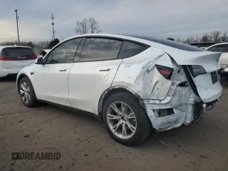 2023 Tesla Model Y Long Range with VIN 7SAYGDEE3PA130988, listed as a Copart auction lot 42172185 with 112,136 mi miles and Salvage Title. Bid and sale history available at DreamBid. Image 2.