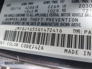 2016 Mazda 6 i Sport with VIN JM1GJ1U55G1472416, listed as a IAAI auction lot 41961622 with 157,315 mi miles and . Bid and sale history available at DreamBid. Image 9.