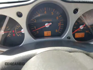 2004 Nissan 350Z Touring with VIN JN1AZ36A44M251374, listed as a Copart auction lot 53182045 with 100,255 mi miles and Salvage Title. Bid and sale history available at DreamBid. Image 9.