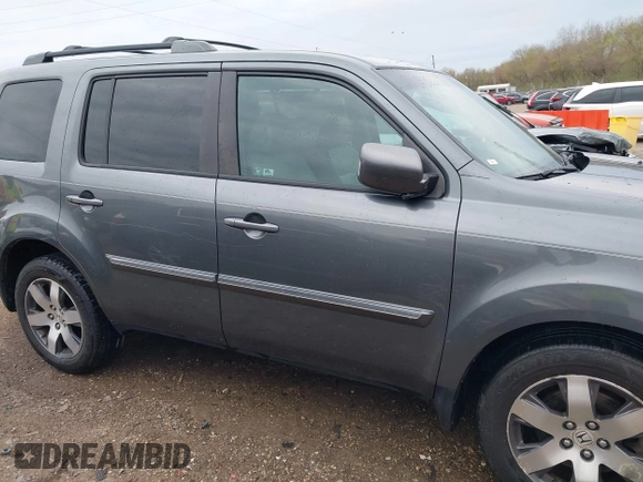 2012 Honda Pilot Touring with VIN 5FNYF4H98CB065003, listed as a IAAI auction lot 41989829 with 91,607 mi miles and . Bid and sale history available at DreamBid. Image 13.