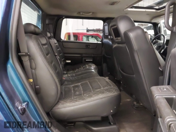 2006 Hummer H2 z VIN 5GRGN22U06H103603, wystawiony jako IAAI lot #41992767 z przebiegiem 165 782 mil mil oraz . Historia ofert i sprzedaży dostępna na DreamBid. Obrazek 8.